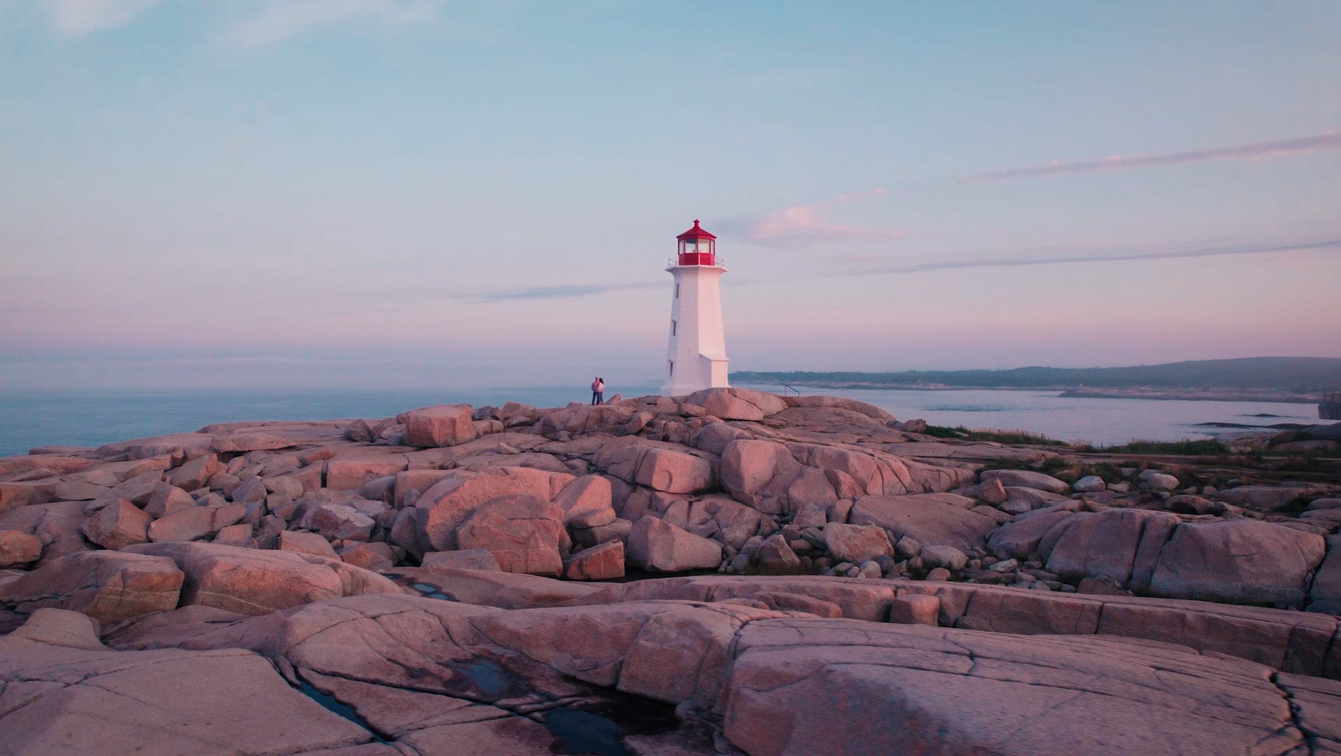 Load video: A dynamic video showcasing various outdoor adventures, featuring individuals canoeing on tranquil mountain lakes at sunset, whitewater kayaking through rapids, and off-roading with ATVs on dirt trails. People are seen hiking through diverse terrains, from dense forests to snowy mountain peaks and rugged coastlines, carrying specialized outdoor gear and durable protective hard cases. The video highlights themes of exploration, resilience, and sustainability, with glimpses of camping and manufacturing processes, culminating in breathtaking Arctic landscapes with polar bears, implicitly promoting the NANUK brand for extreme wilderness and travel.