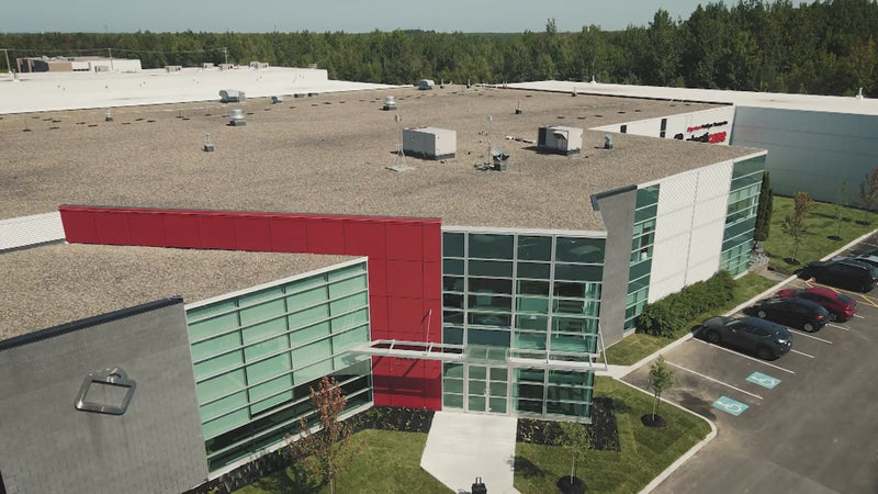 This video showcases the comprehensive journey of rugged protective cases, from manufacturing to diverse real-world applications. It begins with aerial views of a modern industrial facility and internal shots of automated injection molding processes producing durable black cases. Subsequent scenes highlight rigorous testing for impact resistance by hammering a case and demonstrating its waterproofing by submerging it. The video then illustrates the versatility of these cases across various demanding environ